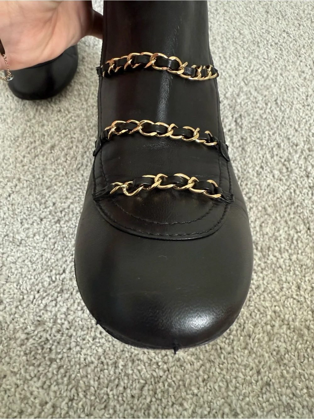 CHANEL Black knee-high lambskin leather boots